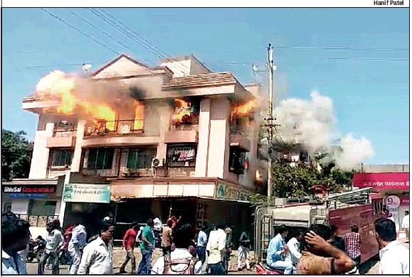 A fire broke out in two flats of a two-storey building in Palghar following an LPG cylinder explosion on Wednesday. Two fire tenders were rushed to the site to contain the flames. No one was injured